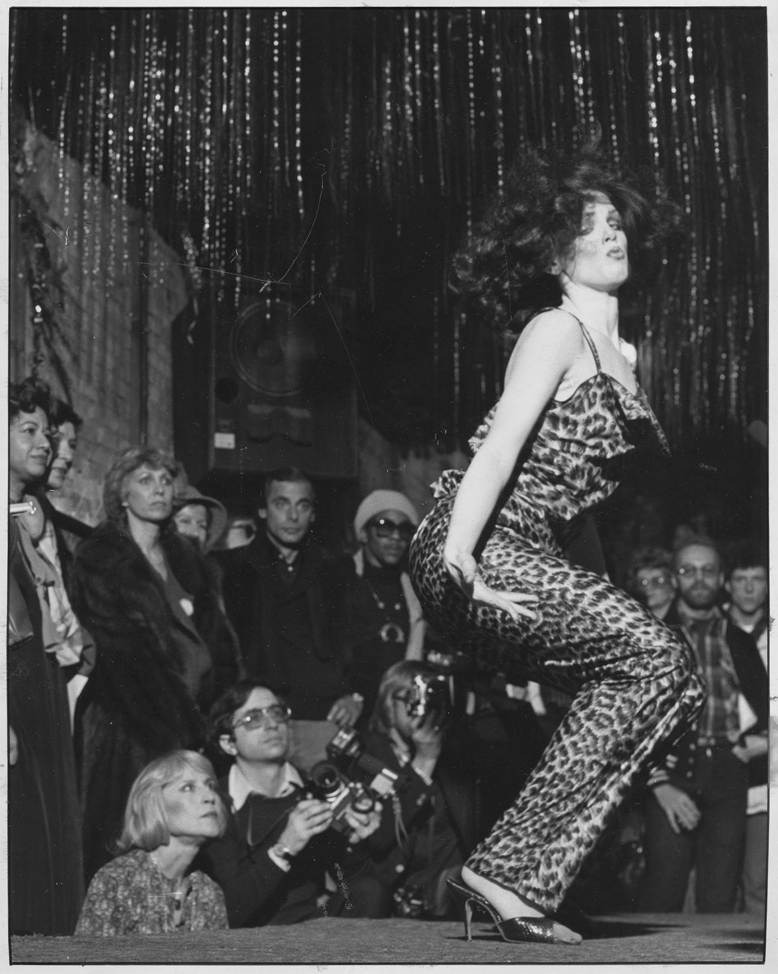 Monica Lynch onstage at Bill Falcon’s fashion show at La Mere Vipere, late 1977/early 1978. Photo courtesy of Monica Lynch.